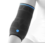 Armbågsskydd Dynamics Plus med dubbelsidig avlastning för tennisarm, golfarm och musarm