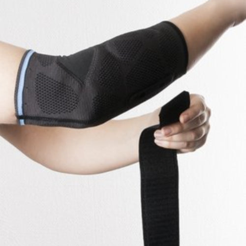 Dynamics Plus elbow brace with double-sided relief for tennis arm, golf arm and mouse arm